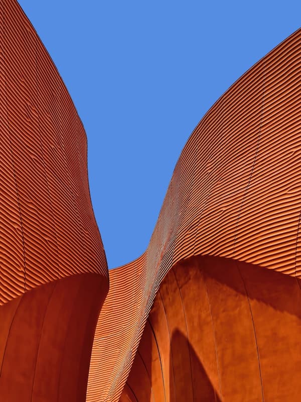 Modern glass architecture reflecting Atlanta's skyline